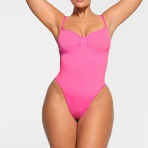 SMIMS Seamless Sculpt Brief
Bodysuit in Neon Orchid (S) NEW/ never worn